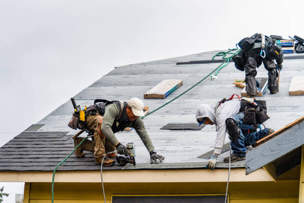 Professional Gutter Installation technician working in Portland, TN
